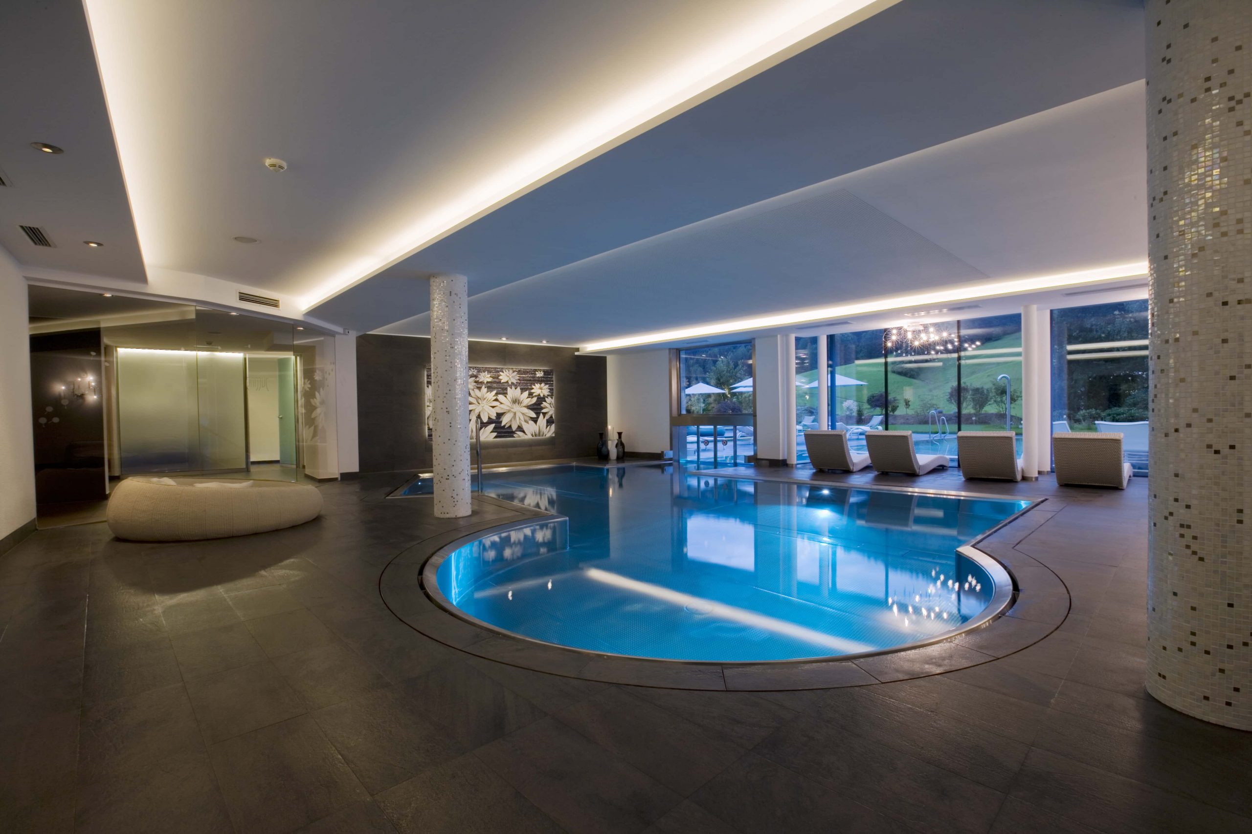 Luxury Bespoke Swimming Pools Bath Indoor Circular Hotel UK Manufacturer Design Installation Stainless Steel Refurbishment Commercial Infinity Indoor Outdoor Engineered Made to Measure Level Deck Skimmer Private Competitive Swimmer Lap Steam Sauna Rooms Spa Whirlpool