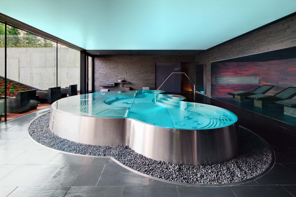 Luxury Bespoke Swimming Pools Bath Indoor Circular Hotel UK Manufacturer Design Installation Stainless Steel Refurbishment Commercial Infinity Indoor Outdoor Engineered Made to Measure Level Deck Skimmer Private Competitive Swimmer Lap Steam Sauna Rooms Spa Whirlpool
