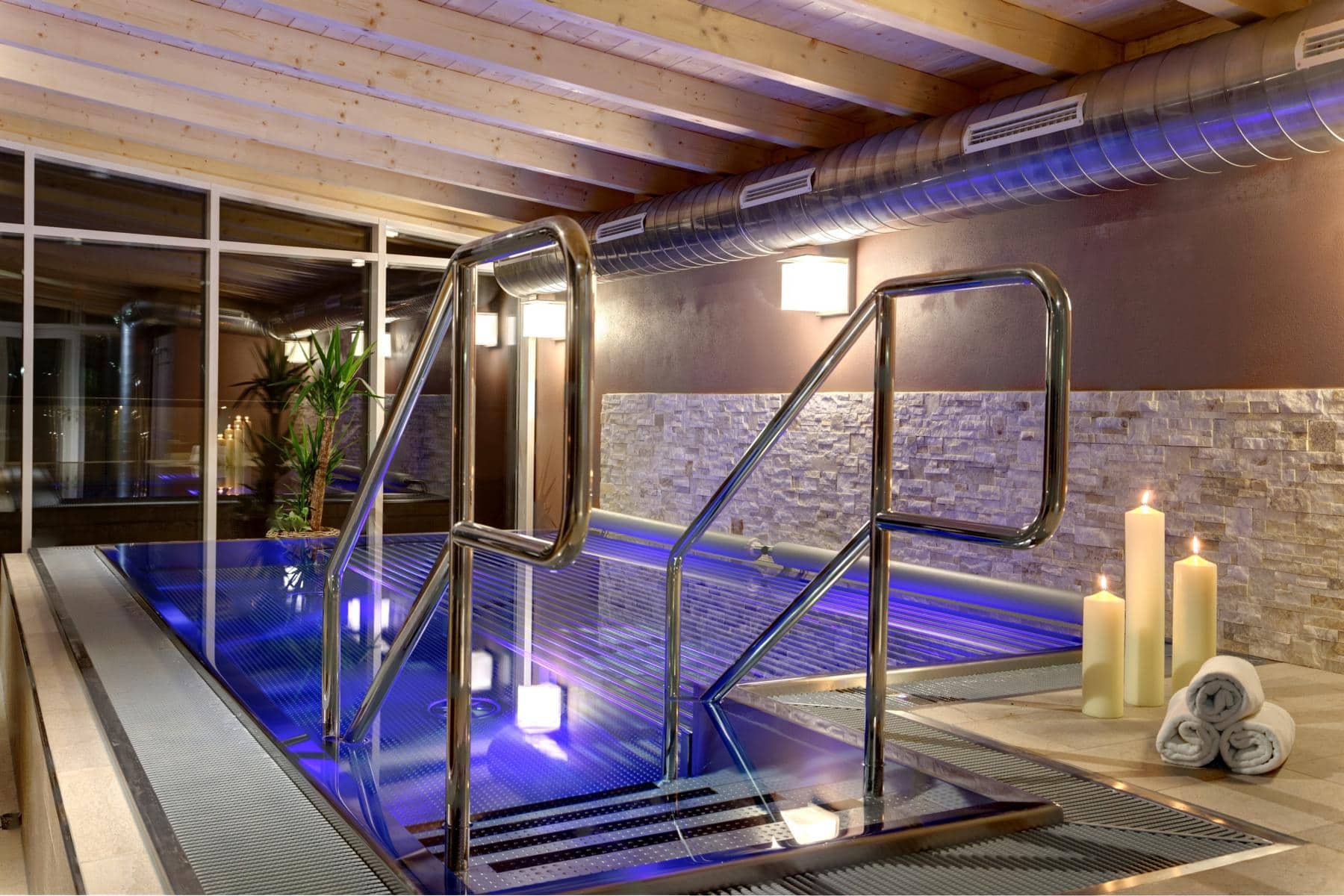 Indoor Hotel Swimming Bath Pool Refurbishment Commercial UK Stainless Steel Lap Competitive Swimming Pools UK Competitive Swimmer Design Installation Company Luxury Bespoke Infinity Indoor Outdoor Engineered Made to Measure Level Deck Skimmer Private Whirlpool One Piece Steam Sauna Rooms