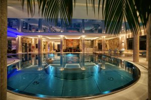 Hotel Swimming Bath Pool Refurbishment Commercial UK Stainless Steel Lap Competitive Indoor Swimming Pools UK Competitive Swimmer Design Installation Company Luxury Bespoke Infinity Indoor Outdoor Engineered Made to Measure Level Deck Skimmer Private Whirlpool One Piece Steam Sauna Rooms